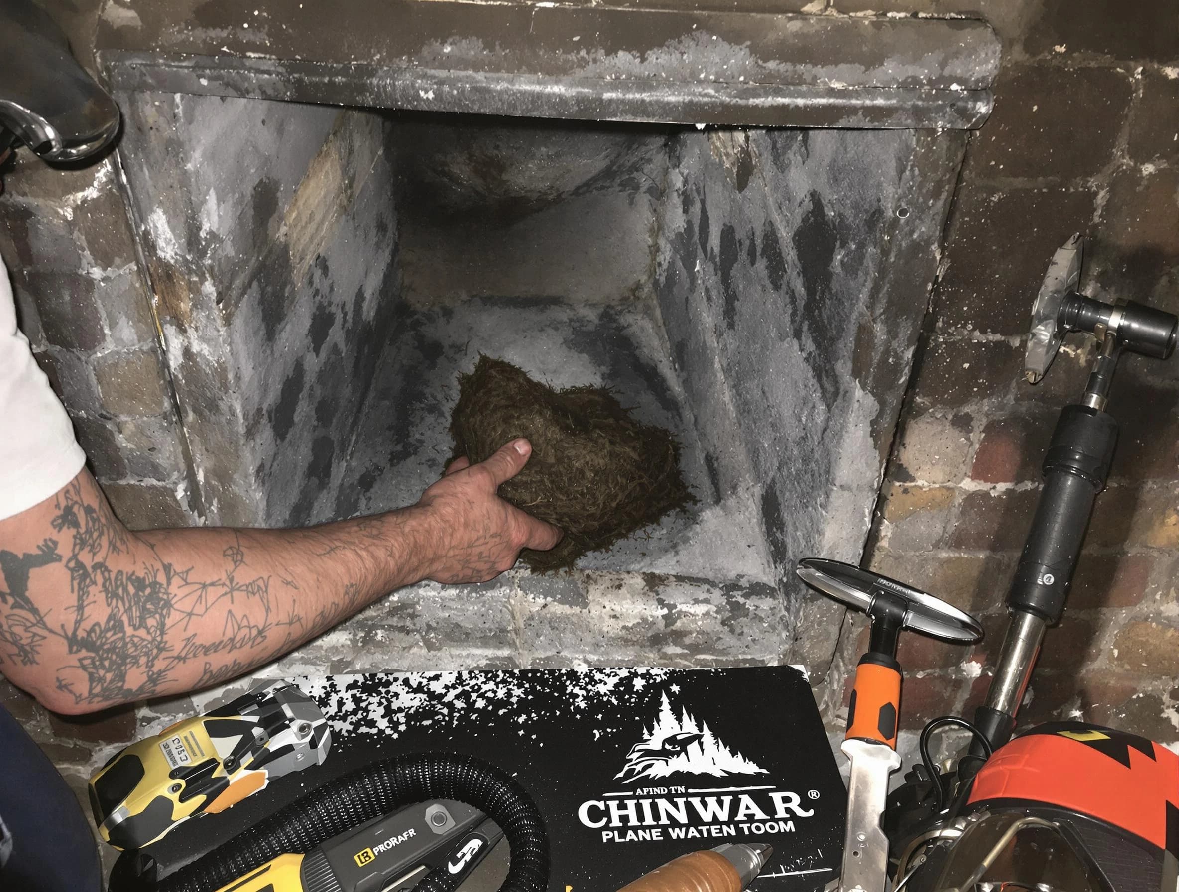 Ocean Chimney Sweep safely removing debris and screening chimney in Ocean, NJ